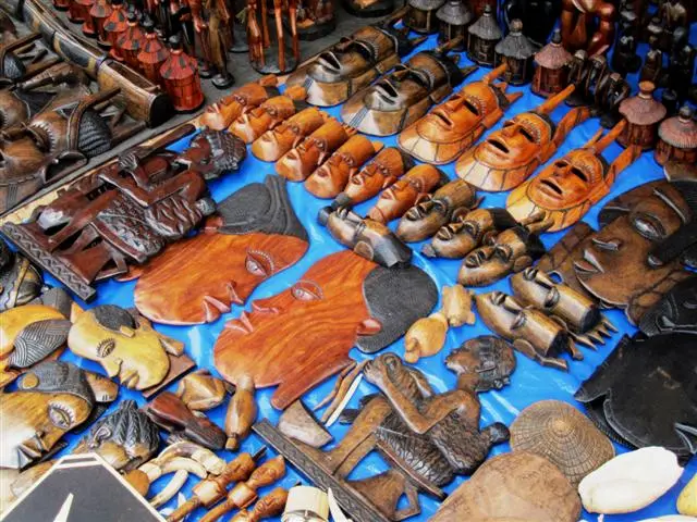 Carved wooden masks at market